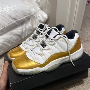 Low Top Jordan 11 metallic gold